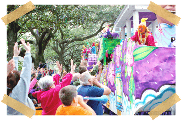 People cheer the Mardi Gras parade in New Orleans.