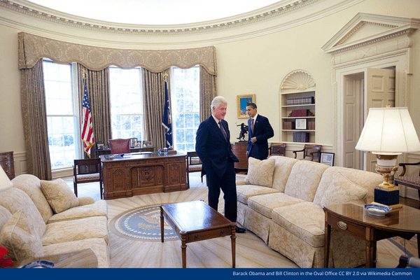 Barack Obama and Bill Clinton in the Oval Office.